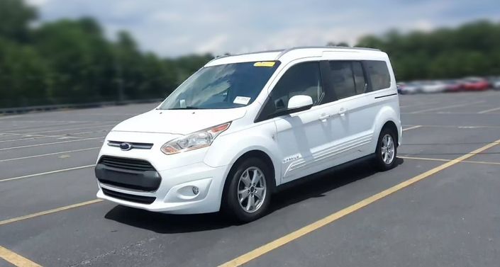 white ford minivan