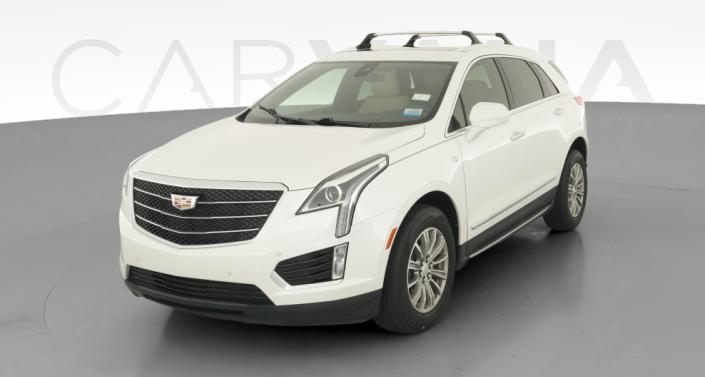 Used Cadillac with Leather Interior in brown or white for Sale