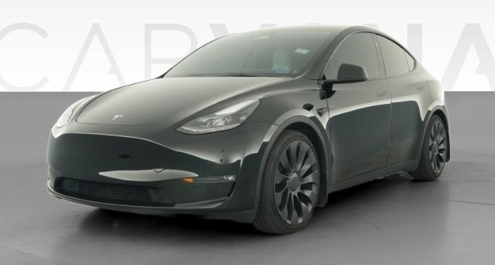 2023 Tesla Model Y Performance All-Wheel Drive in Solid Black — photo 1