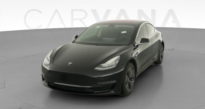 2018 Tesla Model 3 Mid Range Rear-Wheel Drive in Ebony Twilight Metallic — photo 1