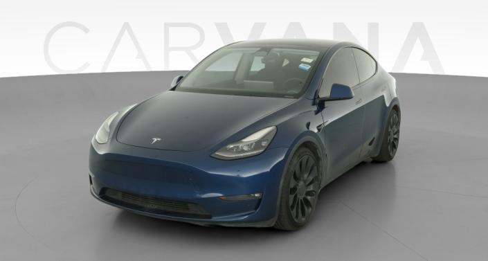 2022 Tesla Model Y Performance All-Wheel Drive in Deep Blue Metallic — photo 1