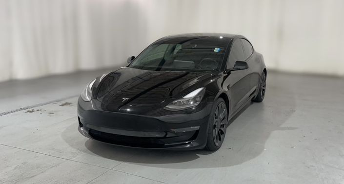 2022 Tesla Model 3 Performance in Solid Black — photo 1