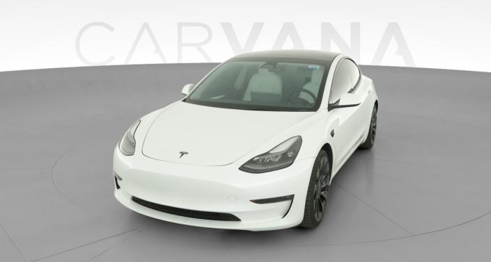 2023 Tesla Model 3 Performance in Pearl White — photo 1