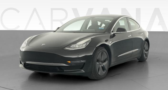 2018 Tesla Model 3 Mid Range Rear-Wheel Drive in Ebony Twilight Metallic — photo 1