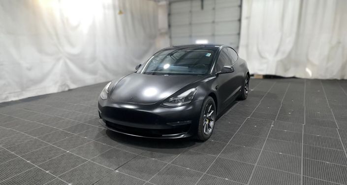 2021 Tesla Model 3 Long Range All-Wheel Drive in Solid Black — photo 1
