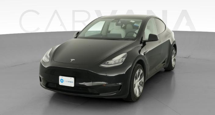 2021 Tesla Model Y Standard Range in Solid Black — photo 1