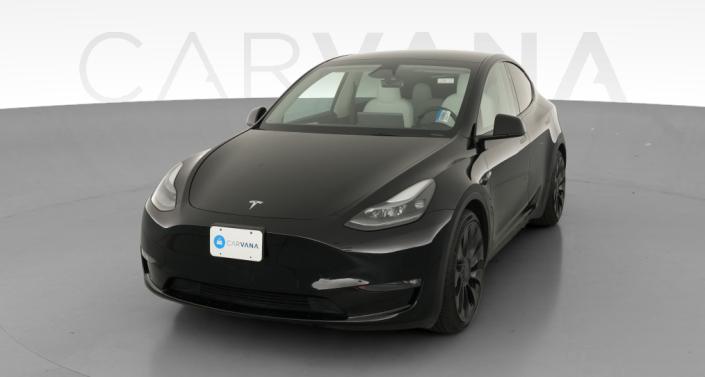 2023 Tesla Model Y Performance All-Wheel Drive in Solid Black — photo 1