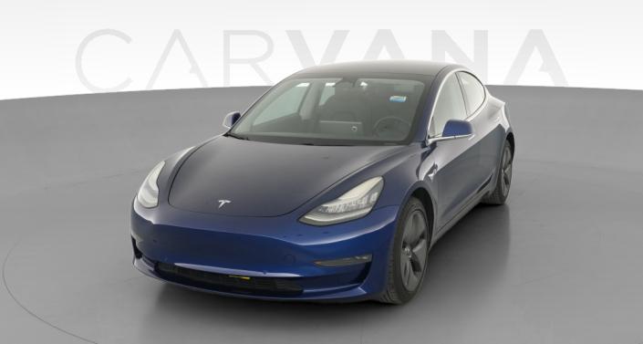 2019 Tesla Model 3 Mid Range Rear-Wheel Drive in Deep Blue Metallic — photo 1