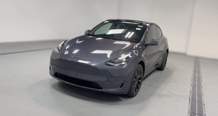 2023 Tesla Model Y Long Range All-Wheel Drive in Midnight Silver Metallic — photo 1