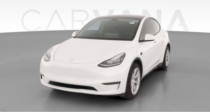 2023 Tesla Model Y Long Range All-Wheel Drive in Pearl White — photo 1