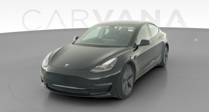 2022 Tesla Model 3 Long Range All-Wheel Drive in Solid Black — photo 1