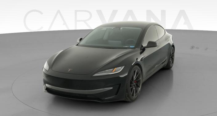 2024 Tesla Model 3 Performance in Solid Black — photo 1