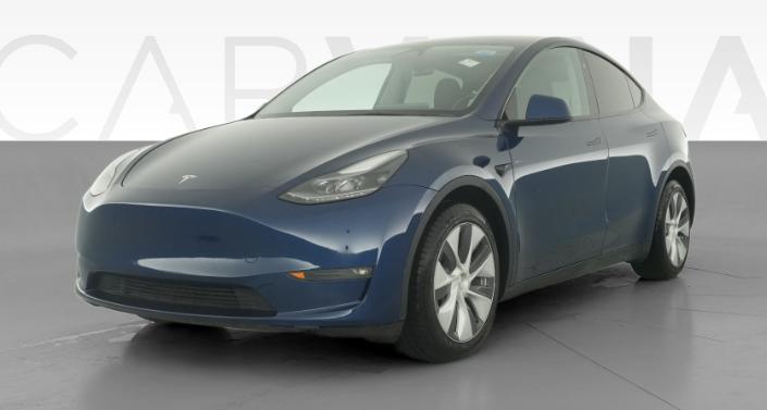 2024 Tesla Model Y Long Range All-Wheel Drive in Deep Blue Metallic — photo 1