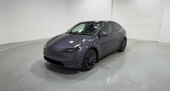 2023 Tesla Model Y Performance All-Wheel Drive in Midnight Silver Metallic — photo 1
