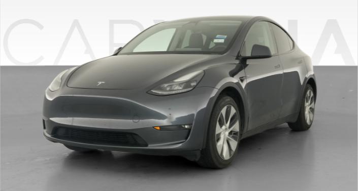 2023 Tesla Model Y Long Range All-Wheel Drive in Midnight Silver Metallic — photo 1