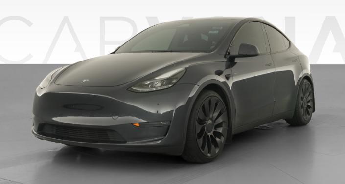 2024 Tesla Model Y Performance All-Wheel Drive in Stealth Grey — photo 1