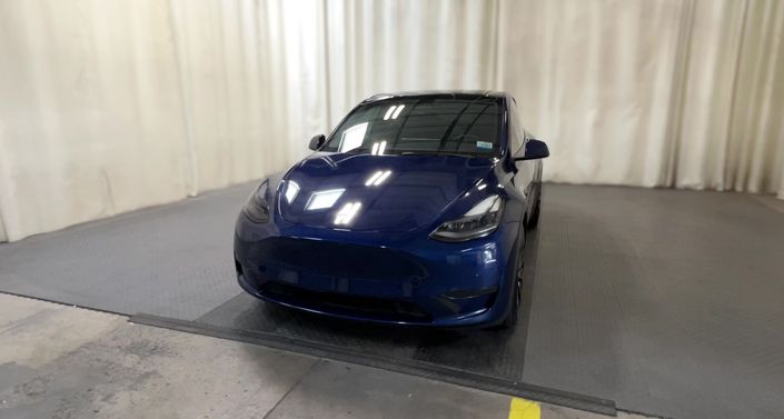 2022 Tesla Model Y Performance All-Wheel Drive in Deep Blue Metallic — photo 1