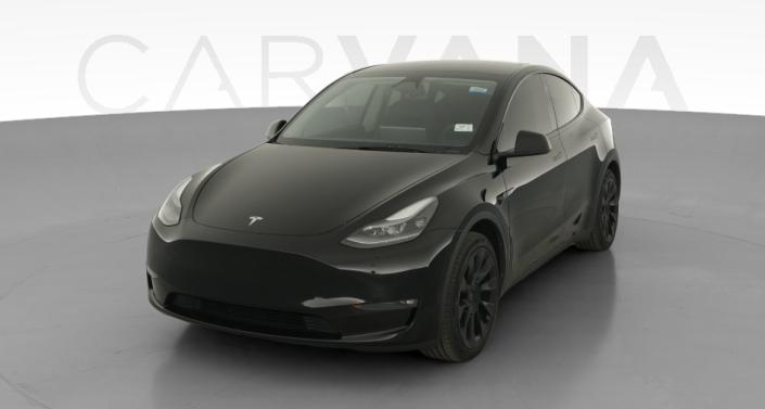2023 Tesla Model Y Long Range All-Wheel Drive in Solid Black — photo 1