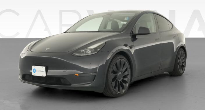2024 Tesla Model Y Performance All-Wheel Drive in Stealth Grey — photo 1