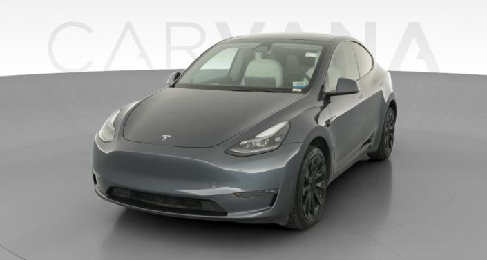 2024 Tesla Model Y Long Range All-Wheel Drive in Midnight Silver Metallic — photo 1