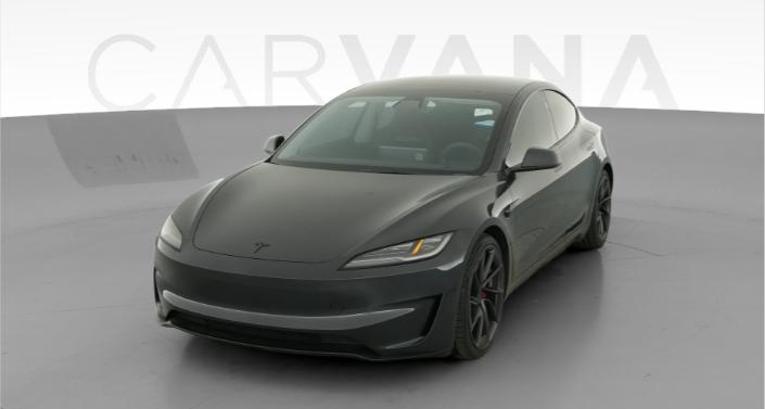 2024 Tesla Model 3 Performance in Stealth Grey — photo 1