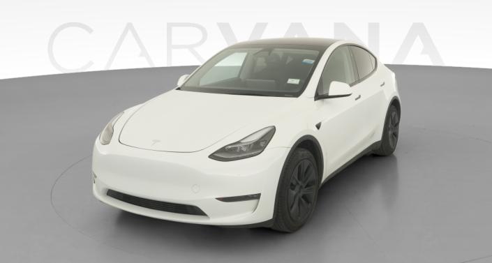 2025 Tesla Model Y Long Range All-Wheel Drive in Pearl White — photo 1