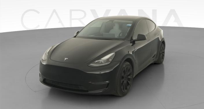 2022 Tesla Model Y Long Range All-Wheel Drive in Solid Black — photo 1