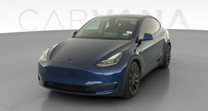 2022 Tesla Model Y Performance All-Wheel Drive in Deep Blue Metallic — photo 1