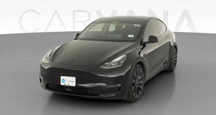 2024 Tesla Model Y Performance All-Wheel Drive in Solid Black — photo 1