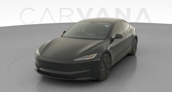 2024 Tesla Model 3 Long Range All-Wheel Drive in Solid Black — photo 1