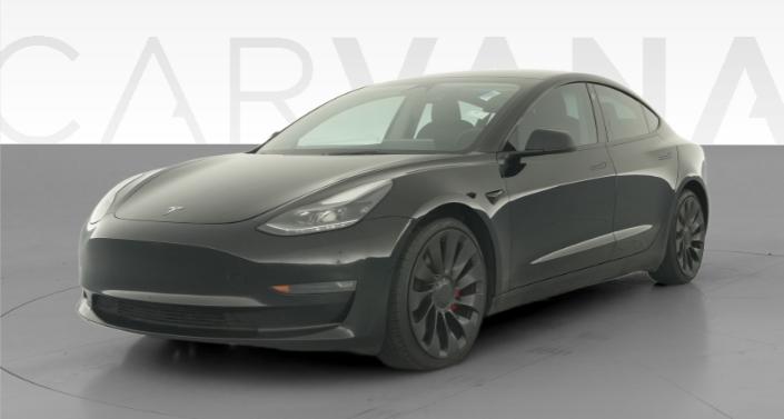 2023 Tesla Model 3 Performance in Solid Black — photo 1