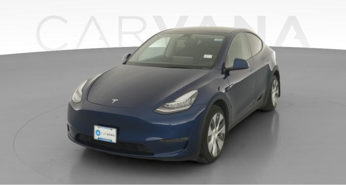 2023 Tesla Model Y Long Range All-Wheel Drive in Deep Blue Metallic — photo 1