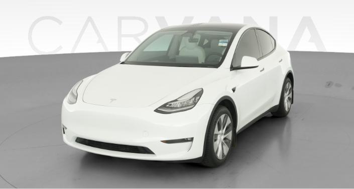 2023 Tesla Model Y Long Range All-Wheel Drive in Pearl White — photo 1