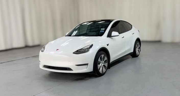 2023 Tesla Model Y Long Range All-Wheel Drive in Pearl White — photo 1