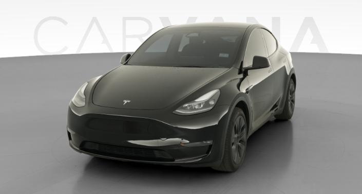 2024 Tesla Model Y Long Range All-Wheel Drive in Solid Black — photo 1