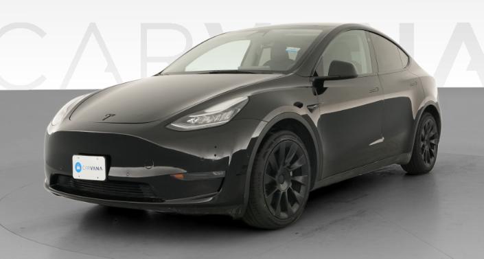 2022 Tesla Model Y Long Range All-Wheel Drive in Solid Black — photo 1