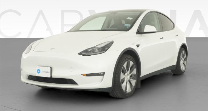 2023 Tesla Model Y Long Range All-Wheel Drive in Pearl White — photo 1
