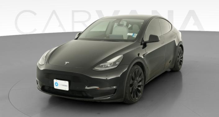 2022 Tesla Model Y Performance All-Wheel Drive in Solid Black — photo 1