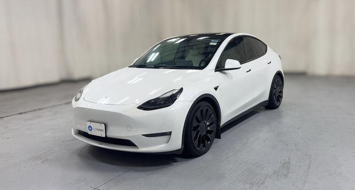 2023 Tesla Model Y Performance All-Wheel Drive in Pearl White — photo 1