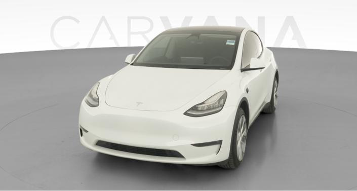 2023 Tesla Model Y Long Range All-Wheel Drive in Pearl White — photo 1
