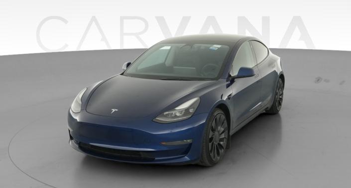 2023 Tesla Model 3 Performance in Deep Blue Metallic — photo 1
