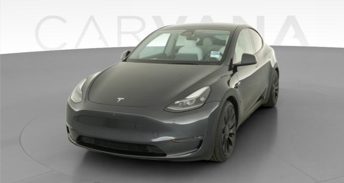 2024 Tesla Model Y Performance All-Wheel Drive in Stealth Grey — photo 1