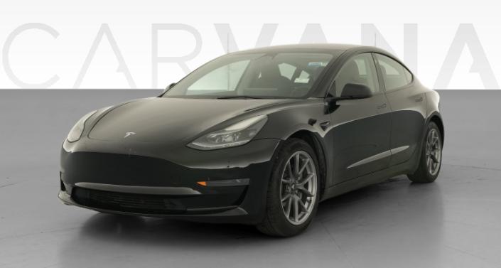2023 Tesla Model 3 Rear-Wheel Drive in Solid Black — photo 1