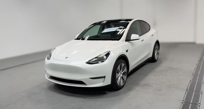 2023 Tesla Model Y Long Range All-Wheel Drive in Pearl White — photo 1