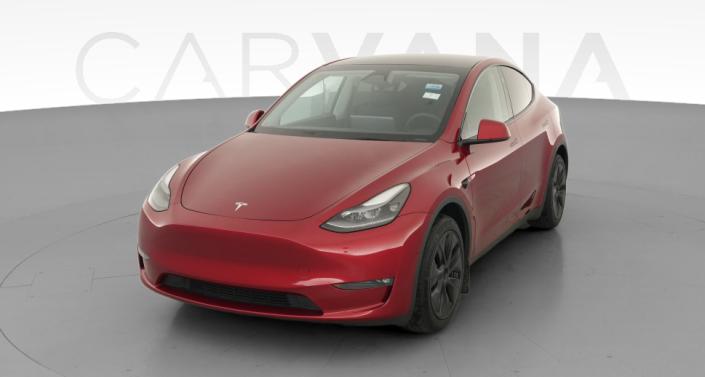 2024 Tesla Model Y Long Range All-Wheel Drive in Ultra Red — photo 1