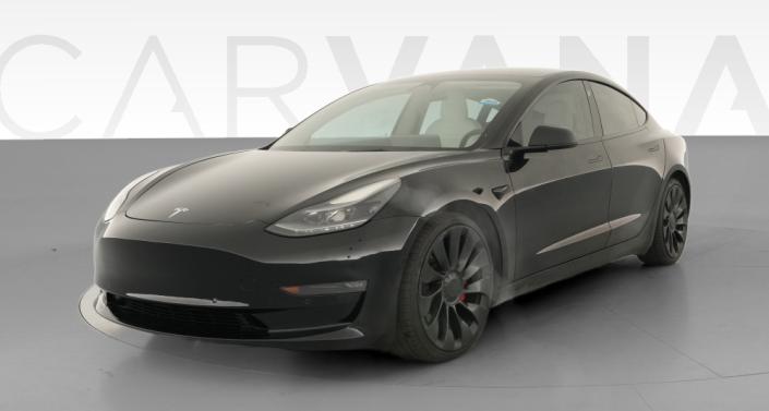 2022 Tesla Model 3 Performance in Solid Black — photo 1