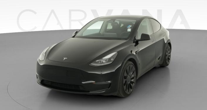 2023 Tesla Model Y Performance All-Wheel Drive in Solid Black — photo 1