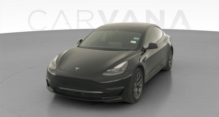 2023 Tesla Model 3 Long Range All-Wheel Drive in Solid Black — photo 1