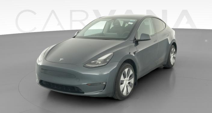 2023 Tesla Model Y Long Range All-Wheel Drive in Midnight Silver Metallic — photo 1