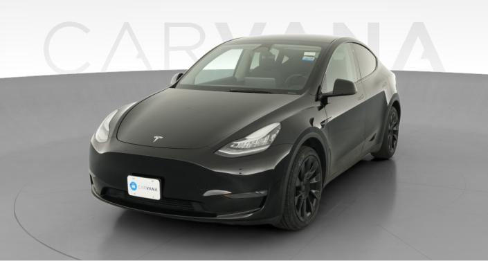 2023 Tesla Model Y Long Range All-Wheel Drive in Solid Black — photo 1